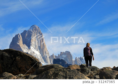 Woman hiking in the mountains, Mount Fitz Roy Woman hiking in the mountains, Mount Fitz Roy 31247365