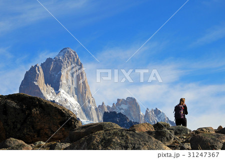 Woman hiking in the mountains, Mount Fitz Roy Woman hiking in the mountains, Mount Fitz Roy 31247367