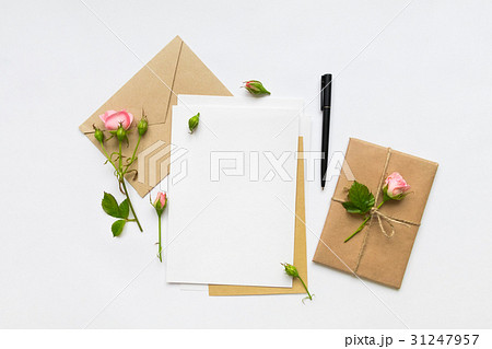 Letter, envelope, gift with pink roses. Top view 31247957