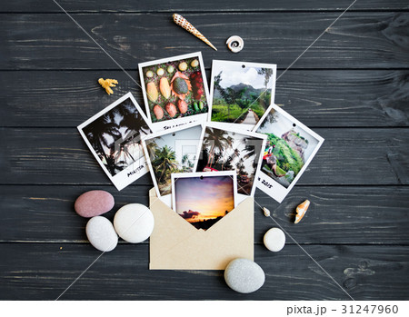 Holiday photos, stones, seashells. Flat lay Holiday photos, stones, seashells. Flat lay 31247960