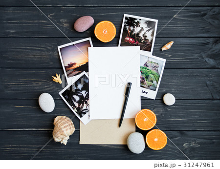 Holiday photos, stones, seashells. Flat lay Holiday photos, stones, seashells. Flat lay 31247961