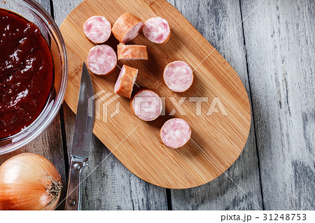 Ingredients ready for preparing German currywurst 31248753