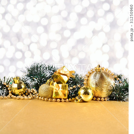 Christmas decorations on a silvery background Christmas decorations on a silvery background 31250960