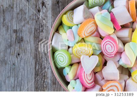 Closeup of colorful mini marshmallows with candy Closeup of colorful mini marshmallows with candy 31253389