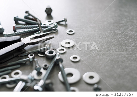 Construction tools. The screws, nuts and bolts 31257557