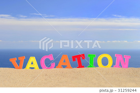 Vacation letters on a beach sand 31259244