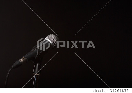 Microphone on empty black background Microphone on empty black background 31261835