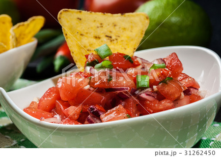 Bowl of fresh salsa with tortilla chips Bowl of fresh salsa with tortilla chips 31262450