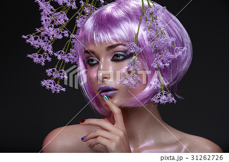 Beautiful girl in purple wig with flowers Beautiful girl in purple wig with flowers 31262726