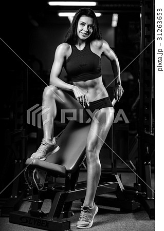 Fitness sexy mode on diet with long female legs gym. Fitness sexy mode on diet with long female legs gym. 31263653
