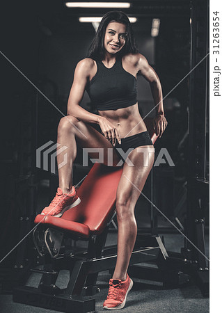 Fitness sexy mode on diet with long female legs gym. Fitness sexy mode on diet with long female legs gym. 31263654