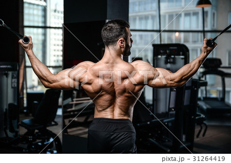 Handsome power athletic man diet training pumping up back muscle Handsome power athletic man diet training pumping up back muscle 31264419