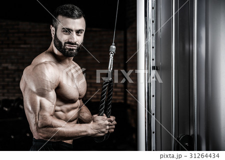 Brutal caucasian handsome fitness men on diet training triceps g 31264434