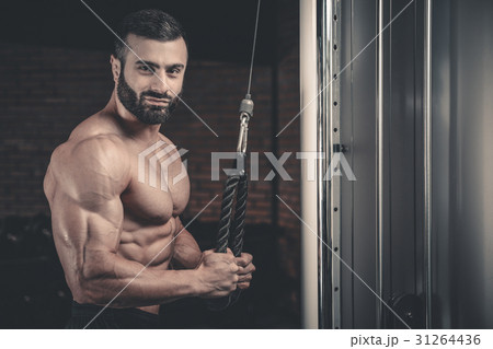 Brutal caucasian handsome fitness men on diet training triceps g 31264436