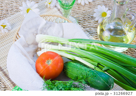 ripe red tomatoes and fresh greenery ripe red tomatoes and fresh greenery 31266927