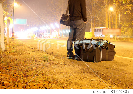 Vintage suitcases, photo camera on road Vintage suitcases, photo camera on road 31270387