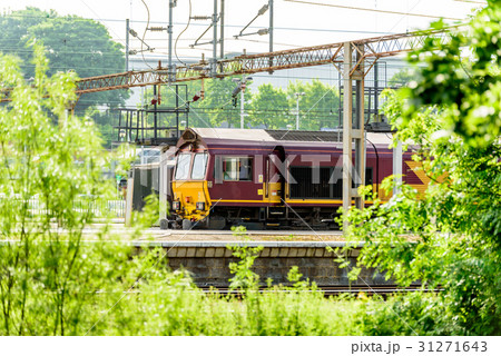 Day view old diesel locomotive at train station Day view old diesel locomotive at train station 31271643