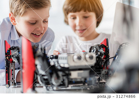 Curious smiling male kids in workshop Curious smiling male kids in workshop 31274866