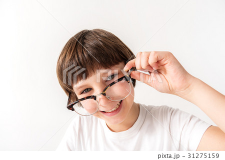 Happy smiling young male person keeping glasses Happy smiling young male person keeping glasses 31275159