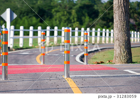 Flexible traffic bollard for bike lane. Flexible traffic bollard for bike lane. 31283059