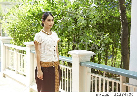 Portrait of beautiful staff standing on the corridor in a hotel. Portrait of beautiful staff standing on the corridor in a hotel. 31284700