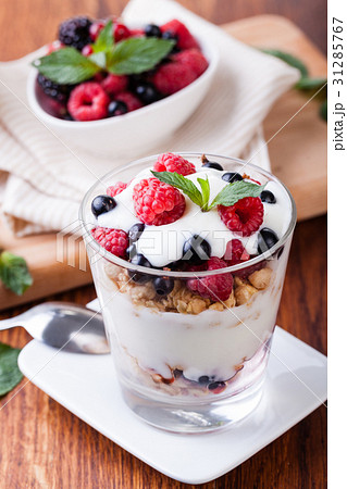 yogurt with muesli and berries yogurt with muesli and berries 31285767