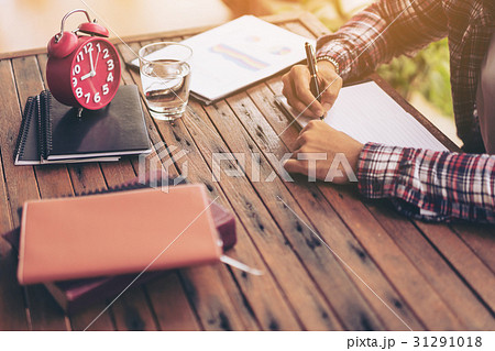 Businessman or freelance working on a desk Businessman or freelance working on a desk 31291018
