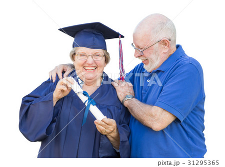 Senior Adult Woman Graduate in Cap and Gown Being Congratulated 31295365