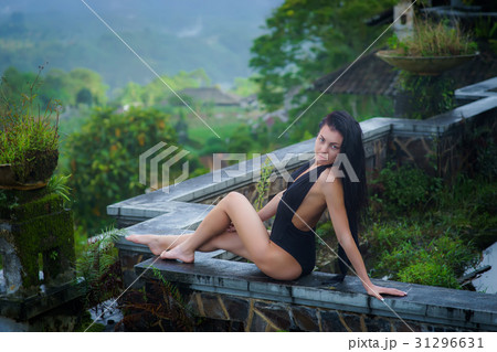 Girl in swimsuit in the mystical abandoned rotten 31296631