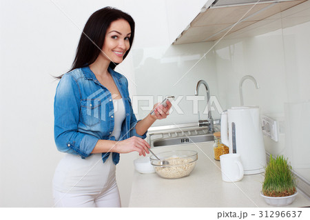 Wellness concept. Beautiful young woman making Wellness concept. Beautiful young woman making 31296637