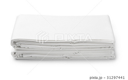 Stack of white folded bedding sheets 31297441
