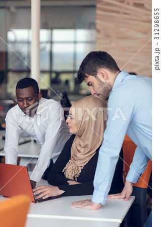 Multiracial contemporary business people working 31298655
