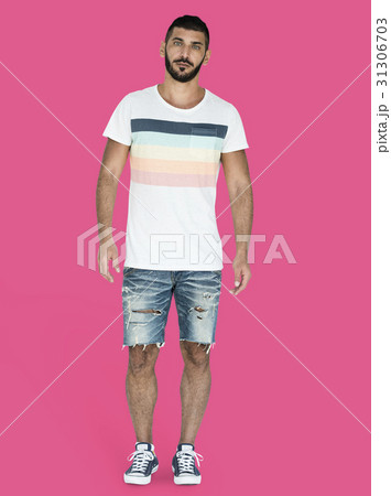 Casual man is standing in a studio shoot 31306703