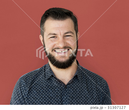 Man standing and smiling for photoshoot Man standing and smiling for photoshoot 31307127