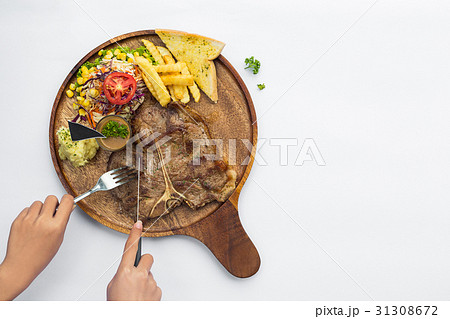 Tender grilled or t-bone steak. 31308672