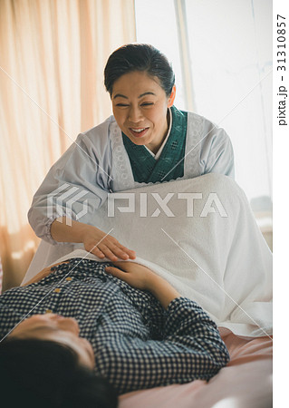 woman during pregnancy or shortly after childbirth woman during pregnancy or shortly after childbirth 31310857