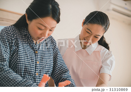 woman during pregnancy or shortly after childbirth 31310869