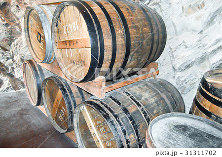 Ancient wooden barrels Ancient wooden barrels 31311702