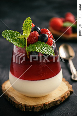 Dessert - panna cotta with berries and berry jelly Dessert - panna cotta with berries and berry jelly 31313688