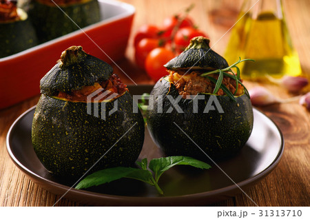 Zucchinies stuffed with meat and vegetables. 31313710