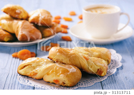 Homemade sweet bread rolls stuffed with cheese. 31313711