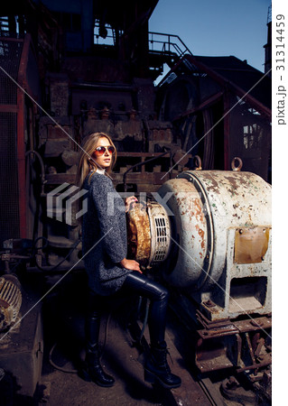 Portrait of a beautiful young woman in an 31314459