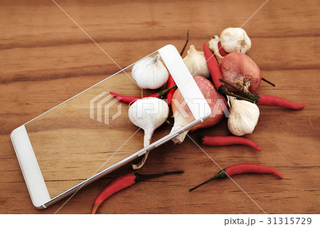 Chili, garlic, shallots With mobile technology 31315729