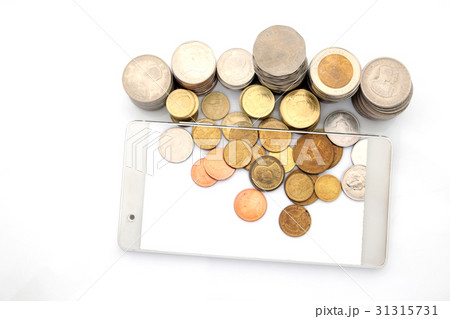 Mobile technology and coins on white background 31315731