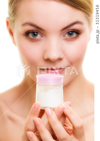 Skin care. Girl applying moisturizing cream. 31319458