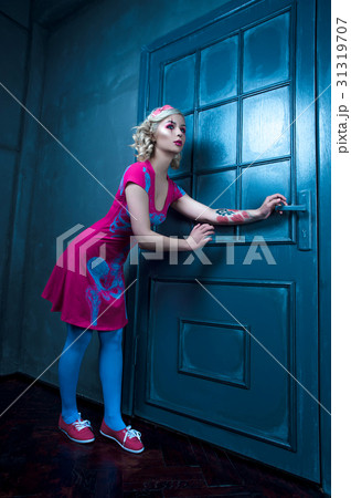 Beautiful blonde girl with creative doll make-up Beautiful blonde girl with creative doll make-up 31319707