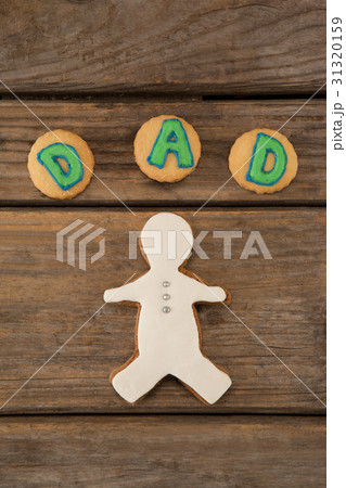 Cookies with text dad on table 31320159