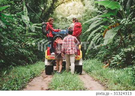 Happy asian young travellers with car off road 31324313
