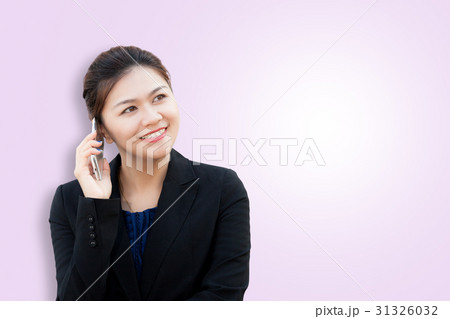 Portrait of smiling business woman using phone 31326032