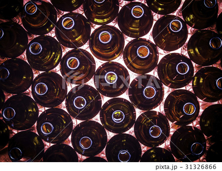 Circular rows of brown color bottles 31326866